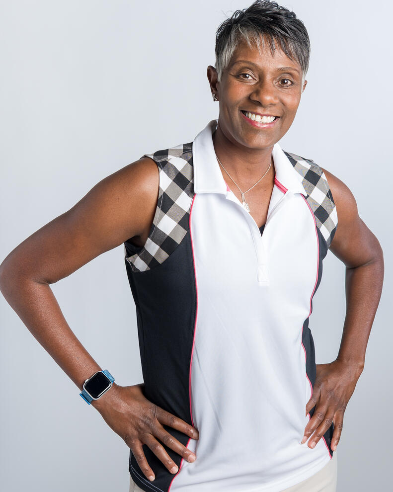 Personal Branding Personal branding portrait smiling black athletic woman hands on hips by Tampa Sidney Oster Photography