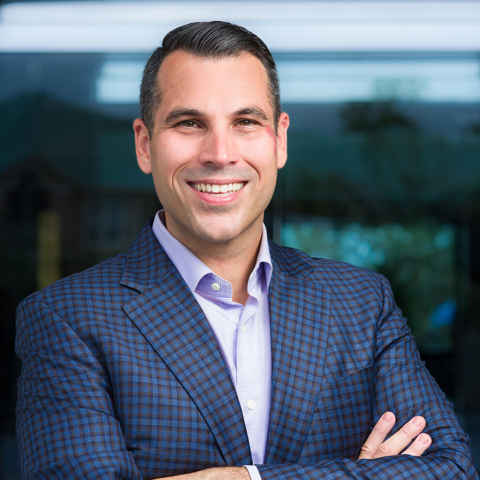 Executive Headshot Executive headshot 40 Under 40 male RevStar revstarconsulting.com blue blazer smiling by Tampa Sidney Oster Photography