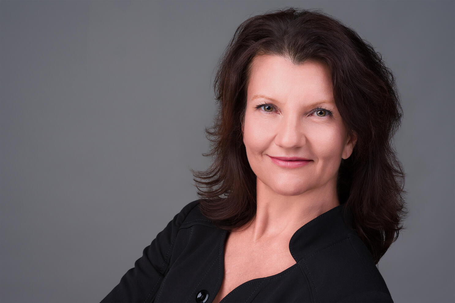 Executive Headshot Professional business headshot of older female executive in black blouse by Tampa photographer Sidney Oster