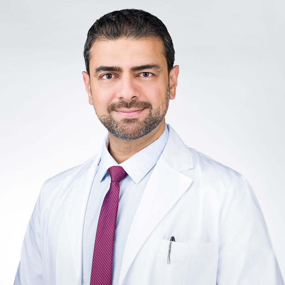 Headshot - male doctor Headshot portrait medical doctor physician in white coat by Tampa professional Sidney Oster