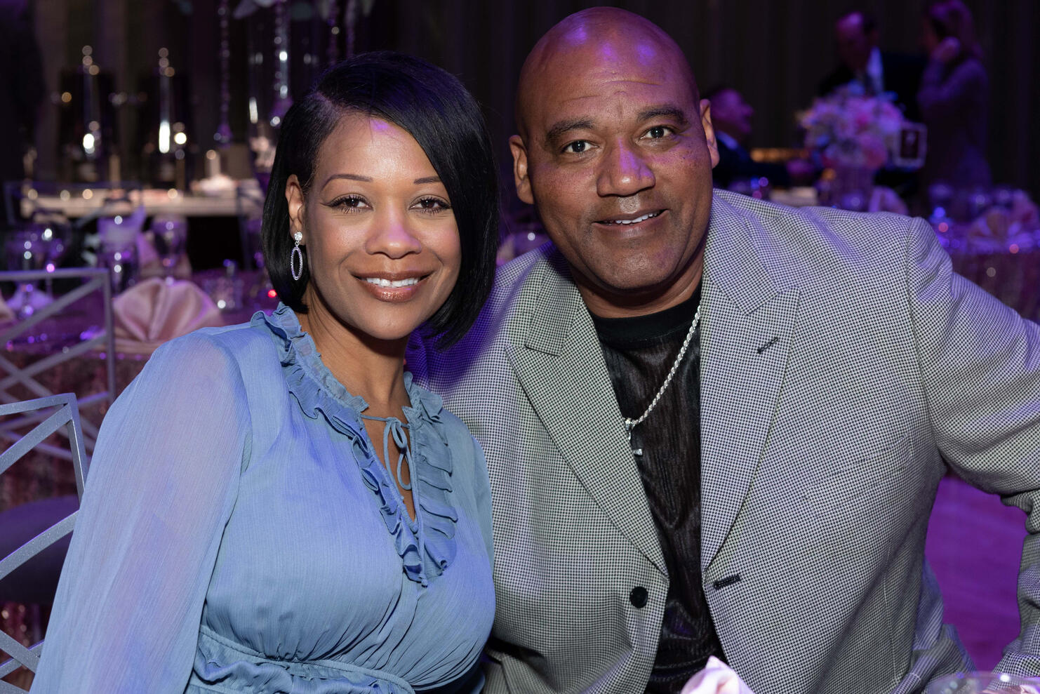 Black couple smiling at a party at The Smith Center for the Performing Arts